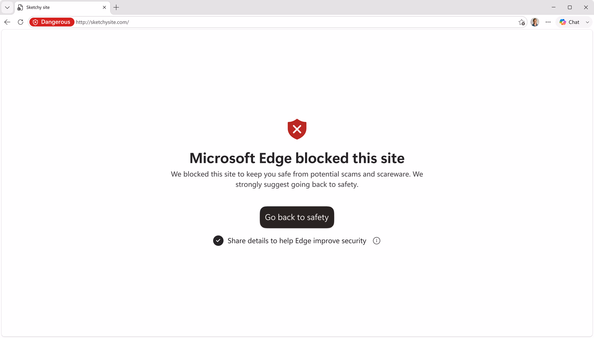 Full-screen Microsoft Edge warning that it blocked the site to protect against scams and scareware.